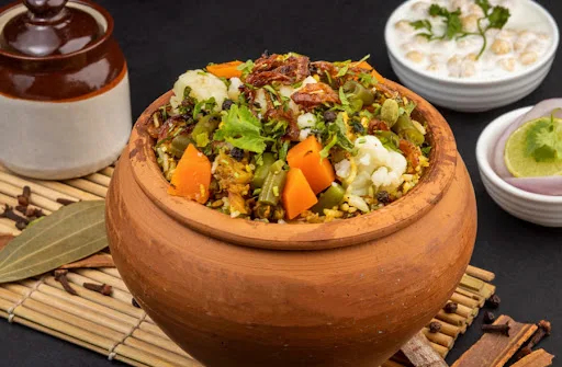 Matka Shahi Subzi Dum Biryani With Raita