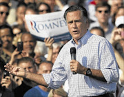 GIVEN APOLOGY:  Republican presidential candidate Mitt Romney speaks to supporters in Columbus Grove, Ohio, this week. Photo: Getty Images