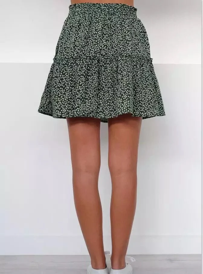 Falda floral con volantes y talle alto para mujer, elegante y cómoda. Ideal para looks casuales o más sofisticados. Perfecta para cualquier ocasión.