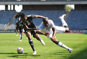 Bonkinkosi Ntuli of AmaZulu challenged by Olisa Ndah of Orlando Pirates during the 2022 Nedbank Cup Last 32 match between Orlando Pirates and AmaZulu