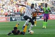 Orlando Pirates midfielder Fortune Makaringe fouls Kaizer Chiefs defender Njabulo Blom in the Telkom Knockout quarterfinal at Moses Mabhida Stadium in November 2019.