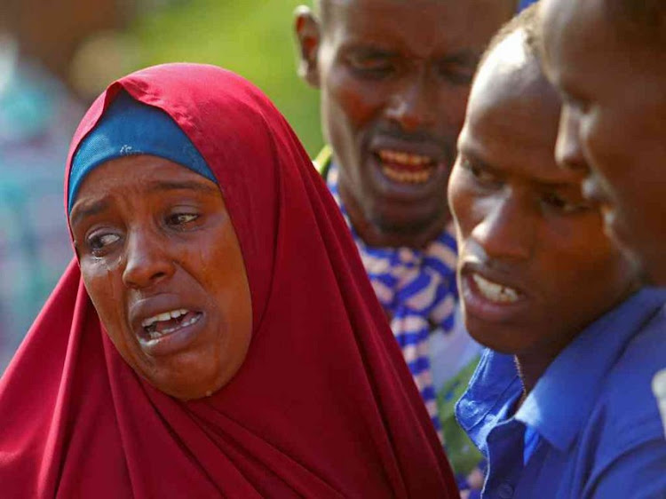 Relatives mourn the killing of their kin in an attack by Somali forces and supported by US troops, at the Madina Hospital in Mogadishu, Somalia, August 25, 2017