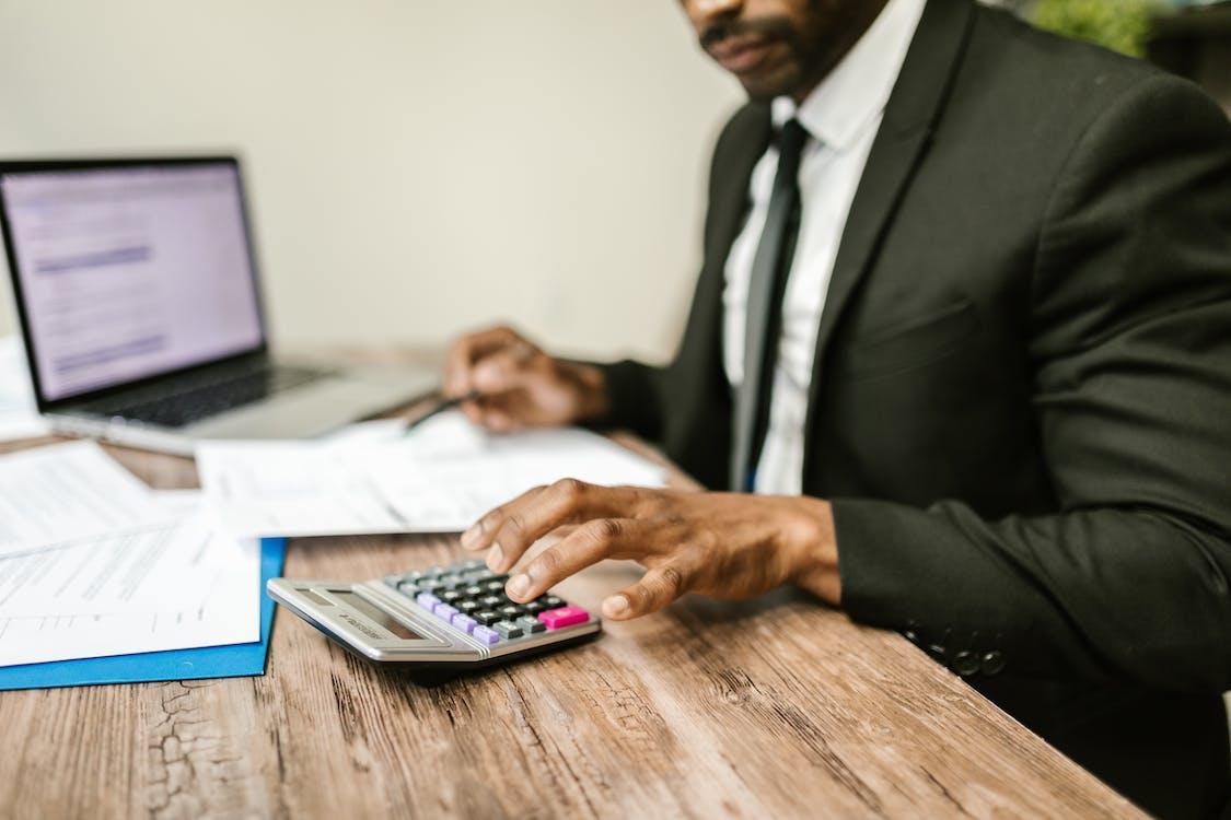 Free A Man Sitting at the Table Stock Photo