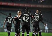 Augustine Mulenga of Orlando Pirates celebrates goal with teammates during the Absa Premiership match between Orlando Pirates and Bidvest Wits 25 April 2018 at Orlando Stadium.