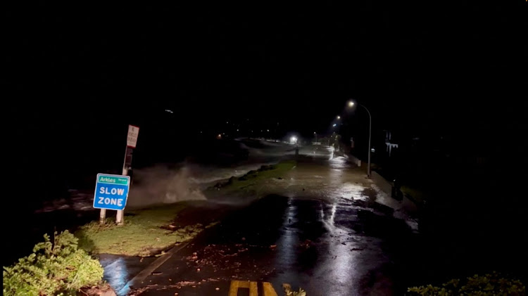 A view shows high tides rising due to Cyclone Gabrielle in Arkles Bay, Auckland, New Zealand February 13, 2023 in this screen grab obtained from a social media video.