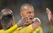 Wayne Arendse celebrates scoring a goal during the CAF Champions League match between Mamelodi Sundowns and Rayon Sports at Lucas Moripe Stadium on March 18, 2018 in Pretoria, South Africa.