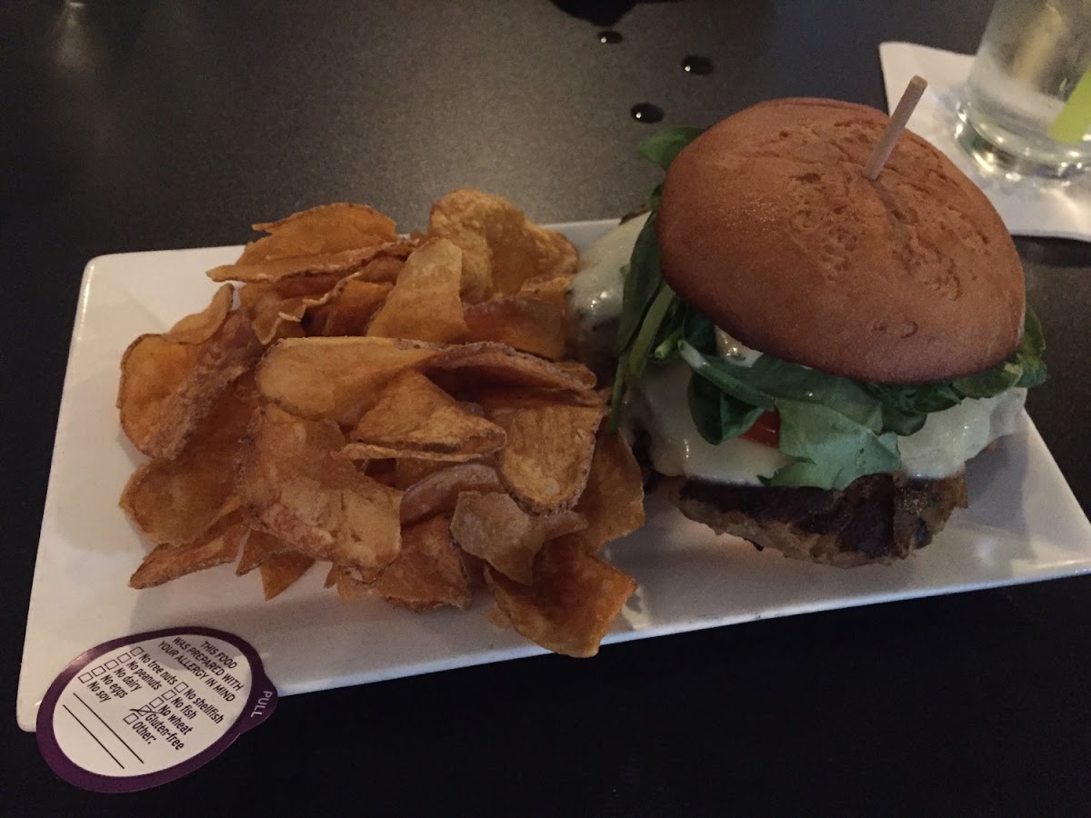 Tuscan turkey burger and house made chips- note the sticker that says it was made with the allergy in mind