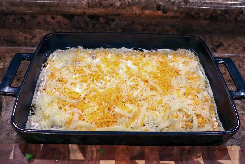 Topped With Cheese And Layers Repeated.