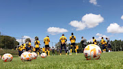 Kaizer Chiefs players pray before warm up during the 2022 Carling Black Label Cup Kaizer Chiefs Media Day at the Chiefs Village, Johannesburg.