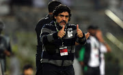 Diego Maradona celebrates during the Etisalat league match between Al wasl and Al shabab from Zabeel Stadium on December 03, 2011 in Dubai, United Arab Emirates.