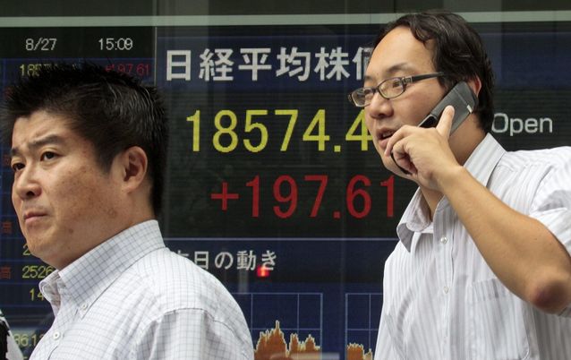 An electronic board displays the Tokyo stock index at a securities office in Tokyo, Japan. Picture: EPA/KIMIMASA MAYAMA