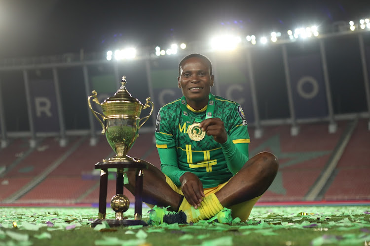 Noko Matlou of South Africa celebrates with winner's trophy during the 2022 Women's Africa Cup of Nations Final between Morocco and South Africa.