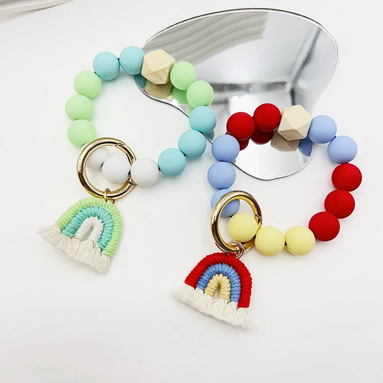 Title 5, Pulseira/Chaveiro com contas redondas de borrac...
