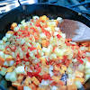 Thumbnail For Stirring In Onions, Peppers, Salt, And Pepper.