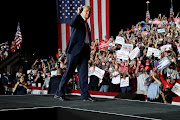 US President Donald Trump departs at the end of a campaign rally, his first since being treated for the coronavirus disease (Covid-19), at Orlando Sanford International Airport in Sanford, Florida, US. File photo 