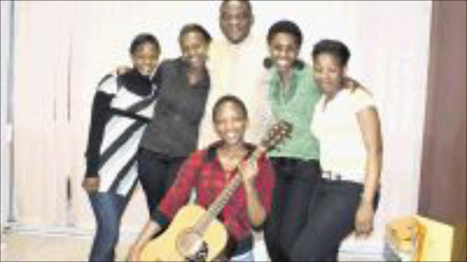 LUCKY PASTOR: Timothy Omotoso with five of the Chrysolites group members. They are, from left, Thabile Mkhwanazi, Mabongi Shinga, Dolge Bophela, Thabisile Mkhize and Hlengiwe Nguse.Pic: MHLABA MEMELA. 12/09/2009. © Sowetan.