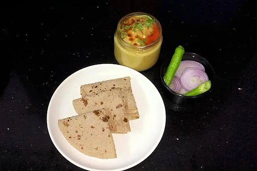 Kadhi Pakoda With Butter Chapati