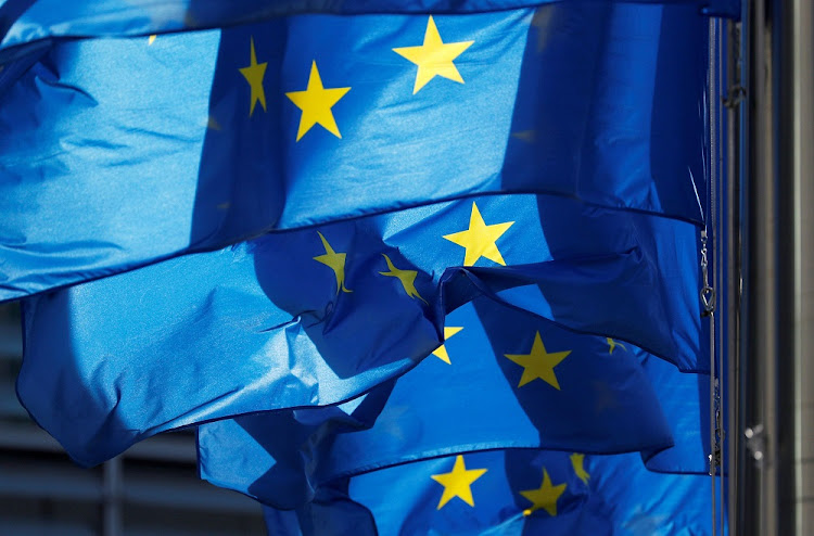 European Union (EU) flags are seen outside the EU Commission headquarters in Brussels, Belgium. File photo: REUTERS/FRANCOIS LENOIR