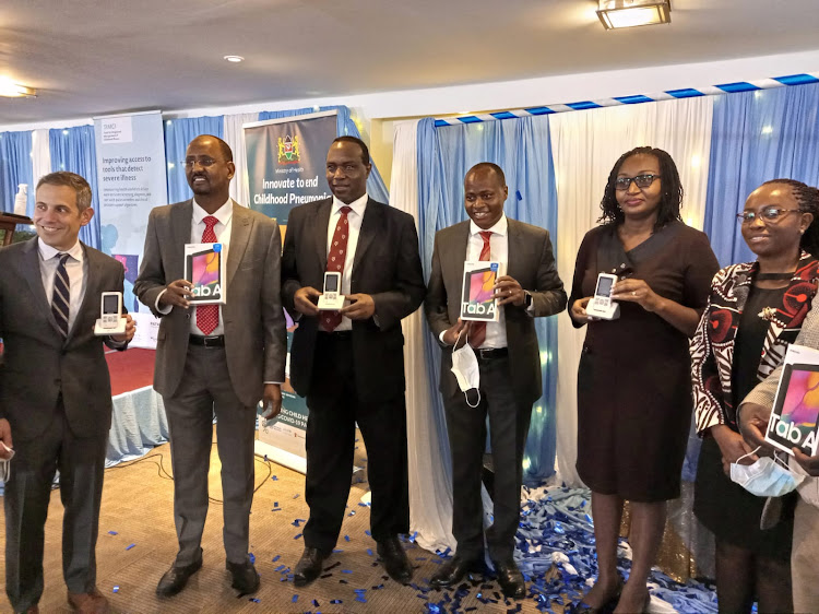 Ag Diretor of Preventive and Promotive Health Services at the Health Ministry Dr Andrew Mulwa and other partners launch the Tools for Integrated Management of Childhood Illness (TIMCI) project at a Nairobi Hotel on November 9, 2021