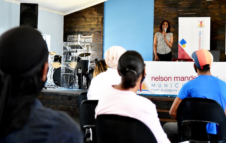 The department of social development’s Ncediswa Ngxishe speaks to about 80 youth at an empowerment workshop at the United Congregational Church in Salt Lake