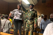 Struggle veterans sing and chant in the Pretoria magistrate's court.