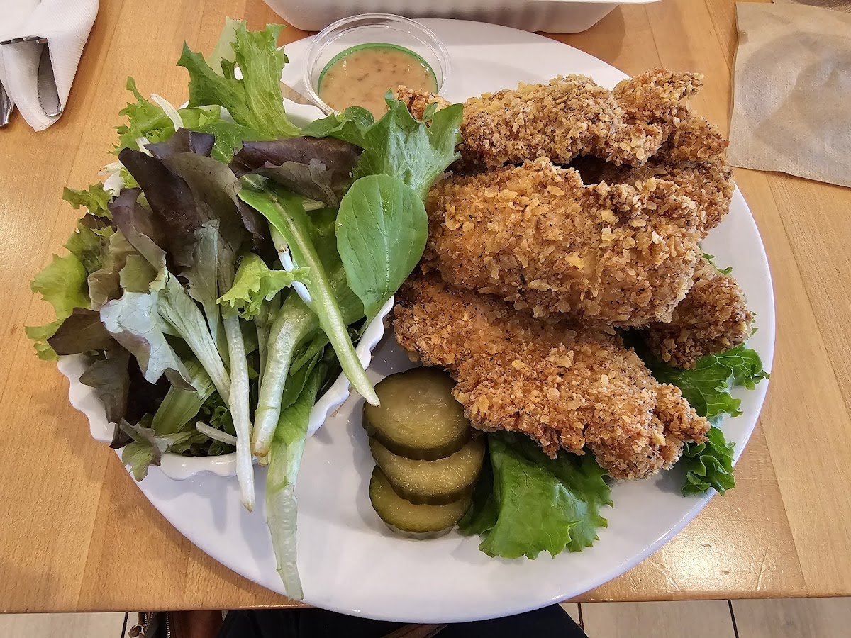 Chicken strip plate withgreens as a side