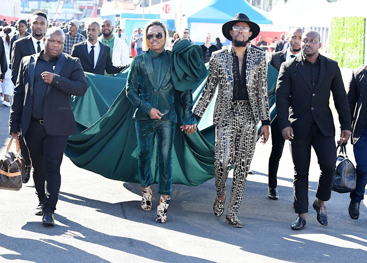 Somizi with Mohale Motaung during the Vodacom Durban July 2019 at Greyville Racecourse on July 06, 2019 in Durban, South Africa.