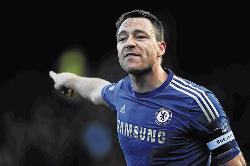 John Terry of Chelsea organises his team during the FA Cup fourth-round match against Brentford on Sunday Picture: JAMIE MCDONALD/GETTY IMAGES