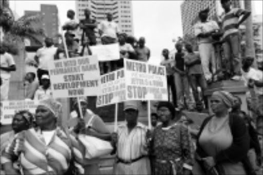 NO WAYS: Traders joined hundreds of taxi drivers and owners to support development of the Warwick Junction. photo: Tebogo Letsi. 28/10/2009. © Sowetan.