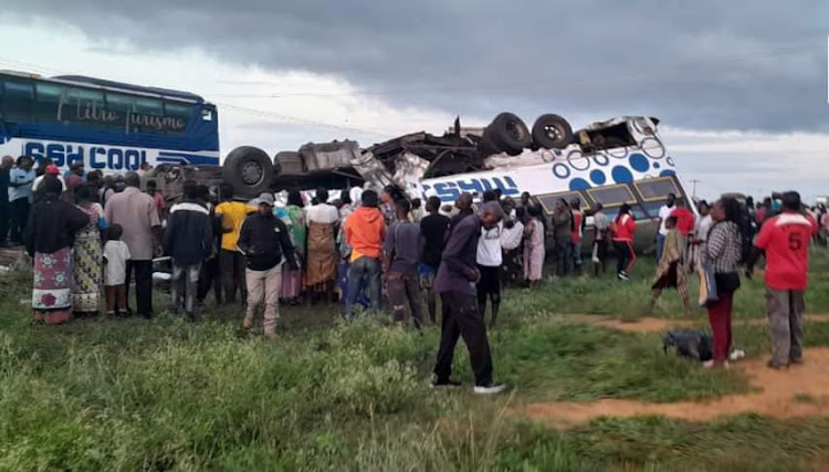 Residents try to rescue people involved in road accident in Kwale County on Sunday, December 24, 2023