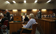 Oscar Pistorius's lawyer Barry Roux, speaks at the start of his trial at the high court in Pretoria, on March 3, 2014. File photo.