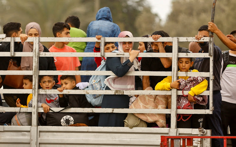 Palestinians flee northern Gaza as Israeli tanks roll deeper into the central Gaza Strip, November 12 2023. Picture: IBRAHEEM ABU MUSTAFA/REUTERS