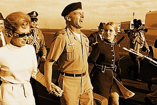 Col. Robert Rheault is accompanied in October 1969 by his then-wife, Caroline Anna Young, and daughter Susanne at Logan International Airport in Boston.