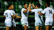 Junior Boks players, including captain Sacha Mngomezulu and Tiaan Lange, celebrate Suleiman Hartzenberg's try during the U20 Six Nations Summer Series final against Wales at Stadio Comunale Monigo in Treviso, Italy .