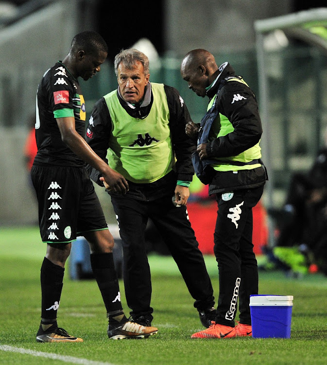 Veselin Jelusic, head coach of Bloemfontein Celtic chat to Ndumiso Mabena of Bloemfontein Celtic while he receives treatment during the Absa Premiership 2017/18 game between Ajax Cape Town and Bloemfontein Celtic at Athlone Stadium, Cape Town on 21 October 2017.