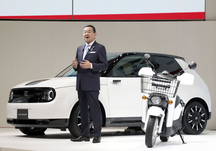 Honda Motor Co president Takahiro Hachigo with the all-electric Honda e at the 2019 Tokyo Motor Show. The Japanese car maker has purchased a 1% stake in Chinese electric vehicle battery maker Contemporary Amperex Technology.