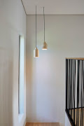 Note how the cords of these pendant lights have been skimmed into the ceiling.