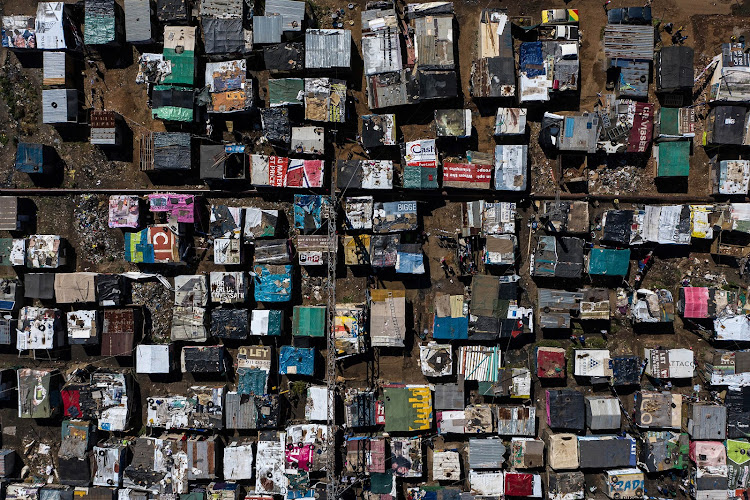 An aerial view of the makeshift roofs of homes in the Booysens shack settlement, a densely populated area in the south of the city.