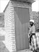 BASIC NEED: Mamoyahabo Rasetsoke, 72, of Bolobedu outside her new toilet. Pic. Alex Matlala. © Sowetan.