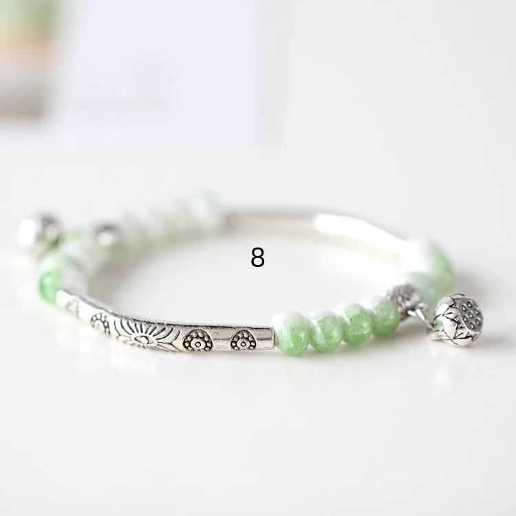 Title 6, Originele handgemaakte kleine keramische armban...