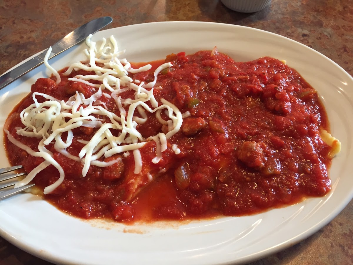 Cheese ravioli with meat sauce. I added mozzarella on half.