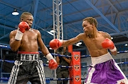 Makazole Tete, left, faces Ronald 'King' Malindi  at the Orient Theatre on Sunday. /Frikkie Kapp/Gallo Images