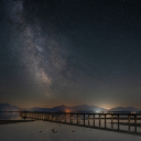 Bridge across the sea at night