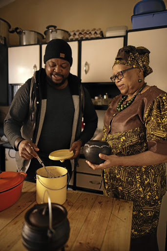 Lesego Semenya and his mother preparing mageu.