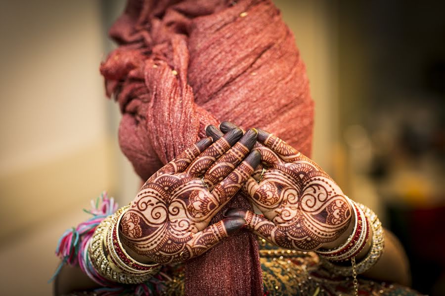 結婚式の写真家Kishen Borkhatria (indianweddingph)。2014 8月10日の写真