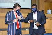 Prof Henk de Jager and deputy minister Buti Manamela elbow bump one another, during his recent visit to CUT.