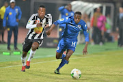 Michee Mika of TP and Onismor Bhasera of SuperSport during the CAF Confederations Cup match between SuperSport United and TP Mazembe at Lucas Moripe Stadium on June 20, 2017 in Pretoria, South Africa. 