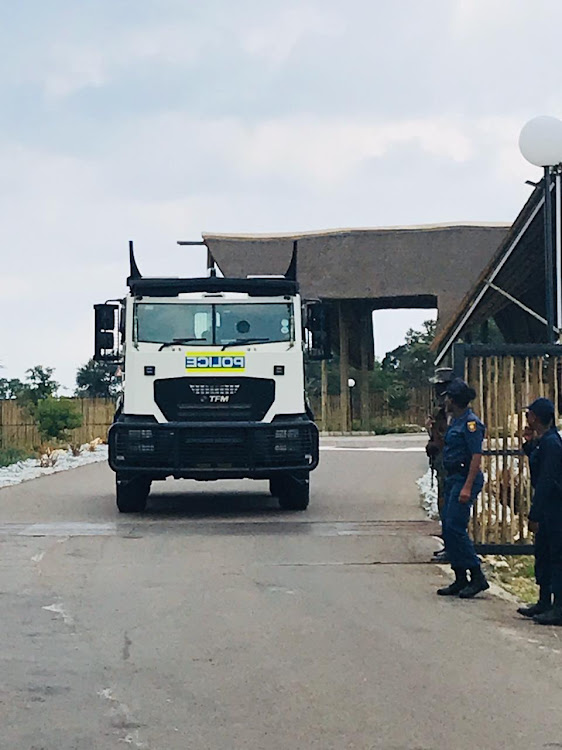 An armoured police vehicle takes up position at the Ranch Resort in Limpopo, where the South Africans being repatriated from Wuhan, China, will be quarantined.