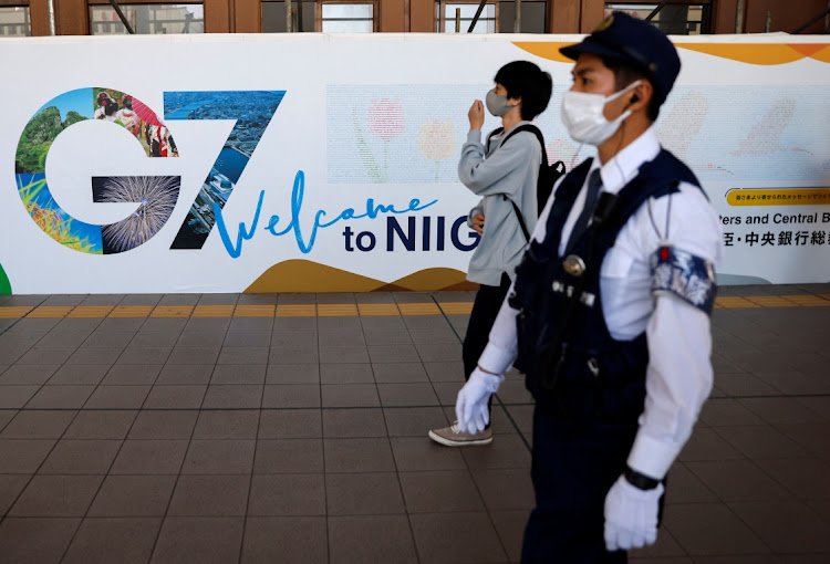 A police officer patrols around Niigata station ahead of the G7 finance ministers and central bank governors' meeting in Niigata, Japan, on May 10 2023.