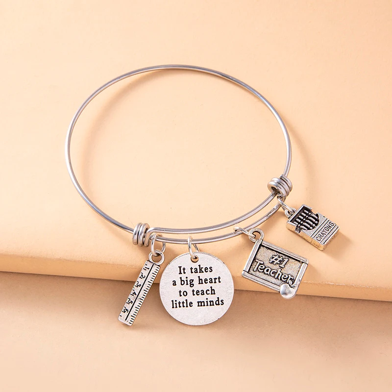 Title 3, Bracelet inspirant, breloques crayons règle arg...